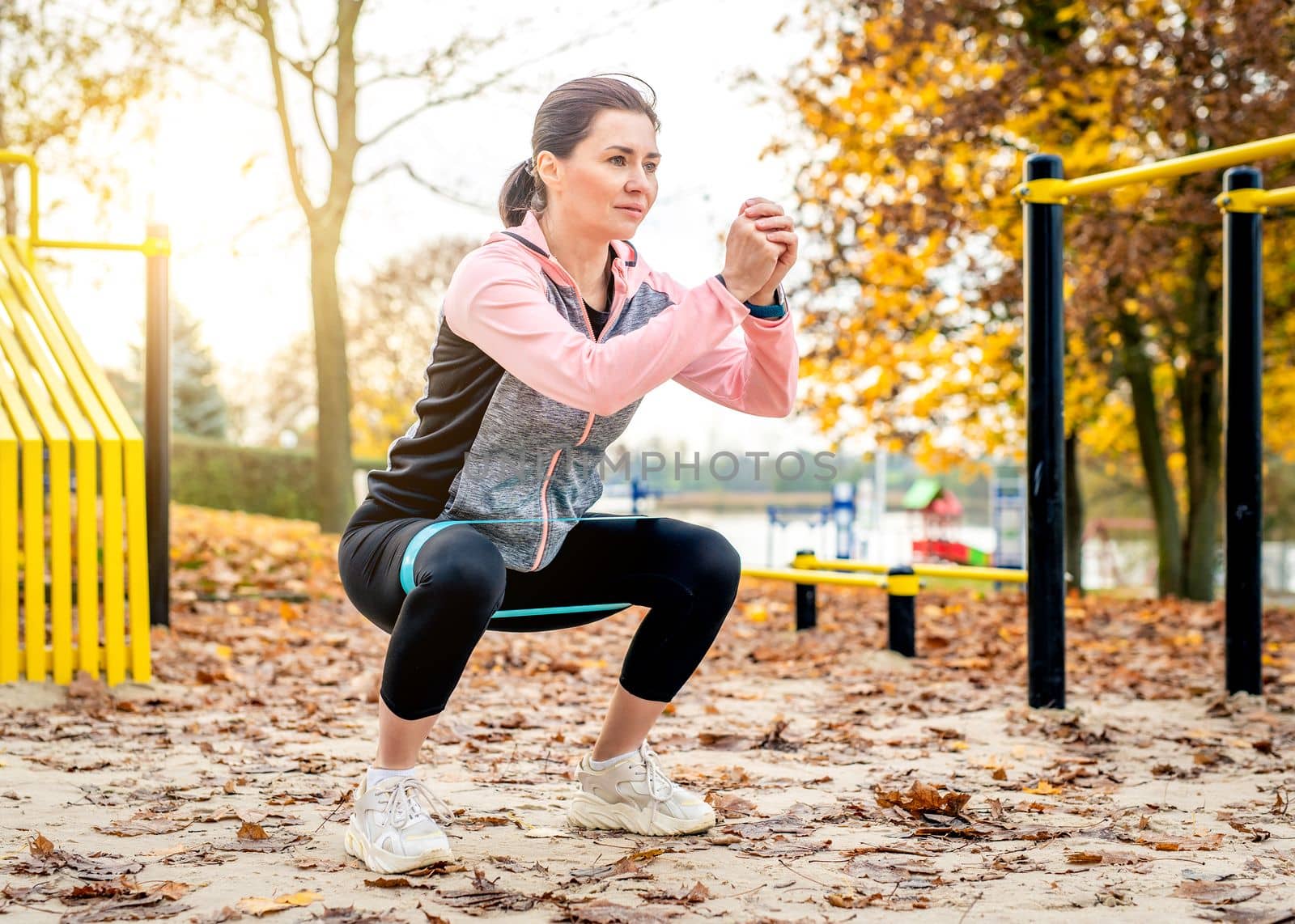 Girl exercising outdoors by tan4ikk1