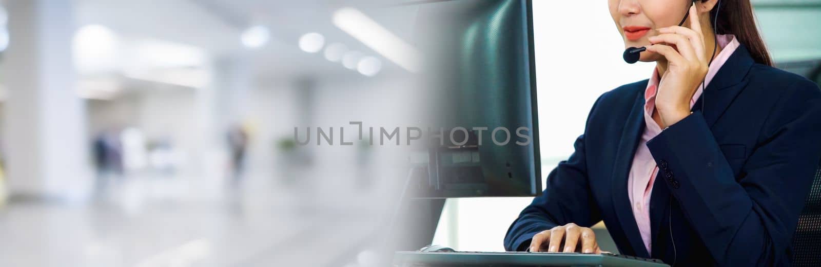 Business people wearing headset working in office in widen view by biancoblue