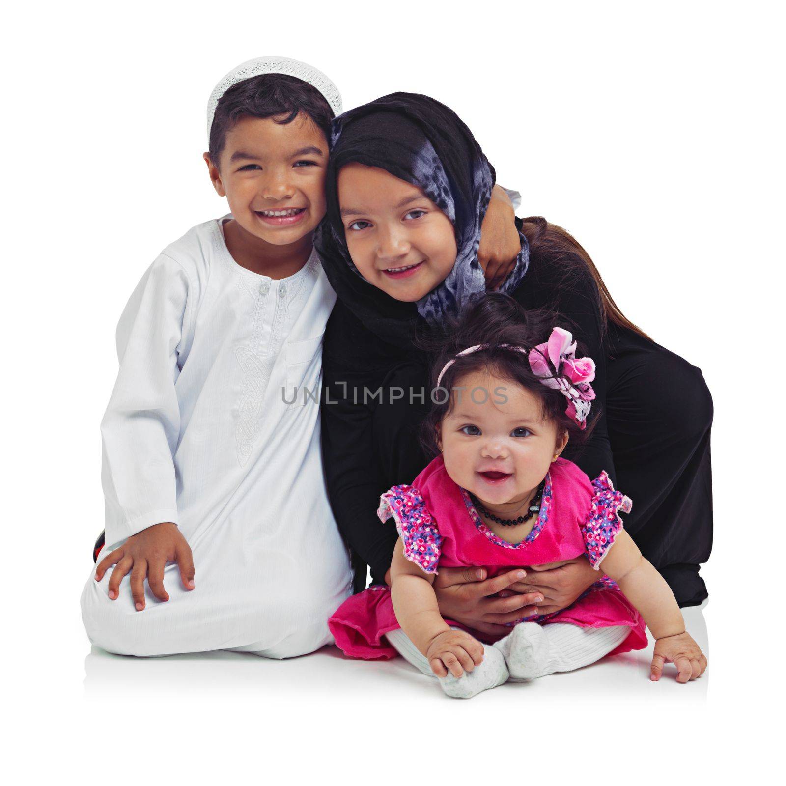 Portrait, children and muslim with a girl, boy and sister in studio isolated on a white background for religion or belief. Family, kids or islam with a brother and siblings on blank space for love by YuriArcurs