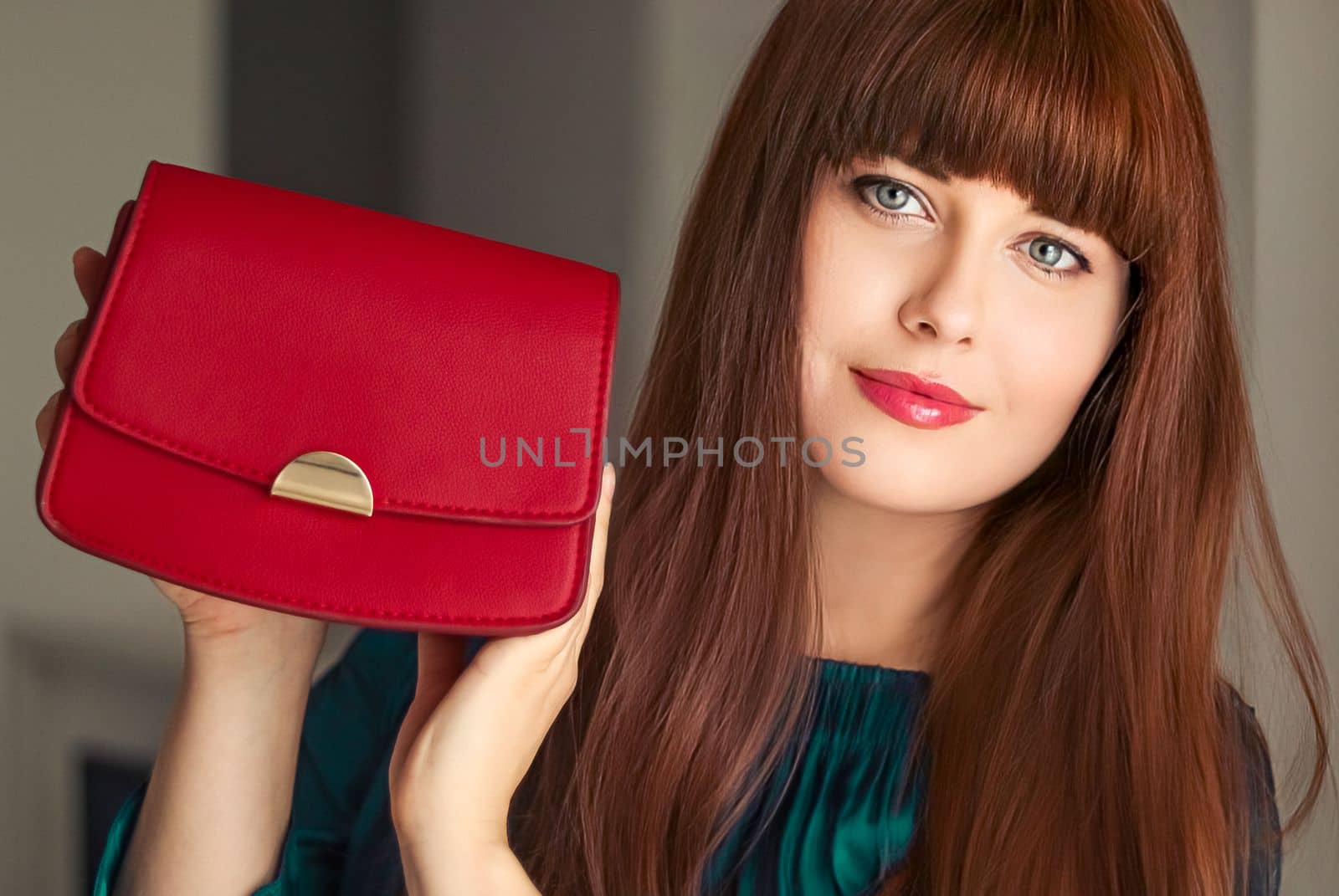 Fashion and accessories, happy beautiful woman holding small red handbag with golden details as stylish accessory and luxury shopping concept