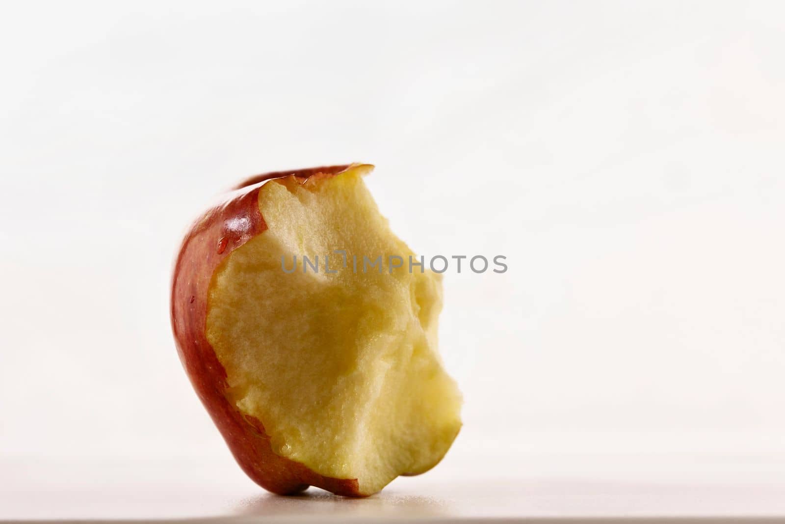 Red eaten apple studio shot by victimewalker