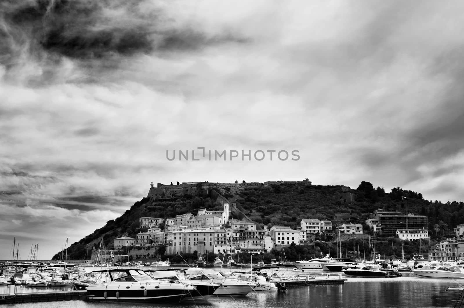 Porto Ercole , Italy , 10 October 2022  , old town's port ,Monte Argentario , Tuscany , Italy , Boats in harbor in sea bay