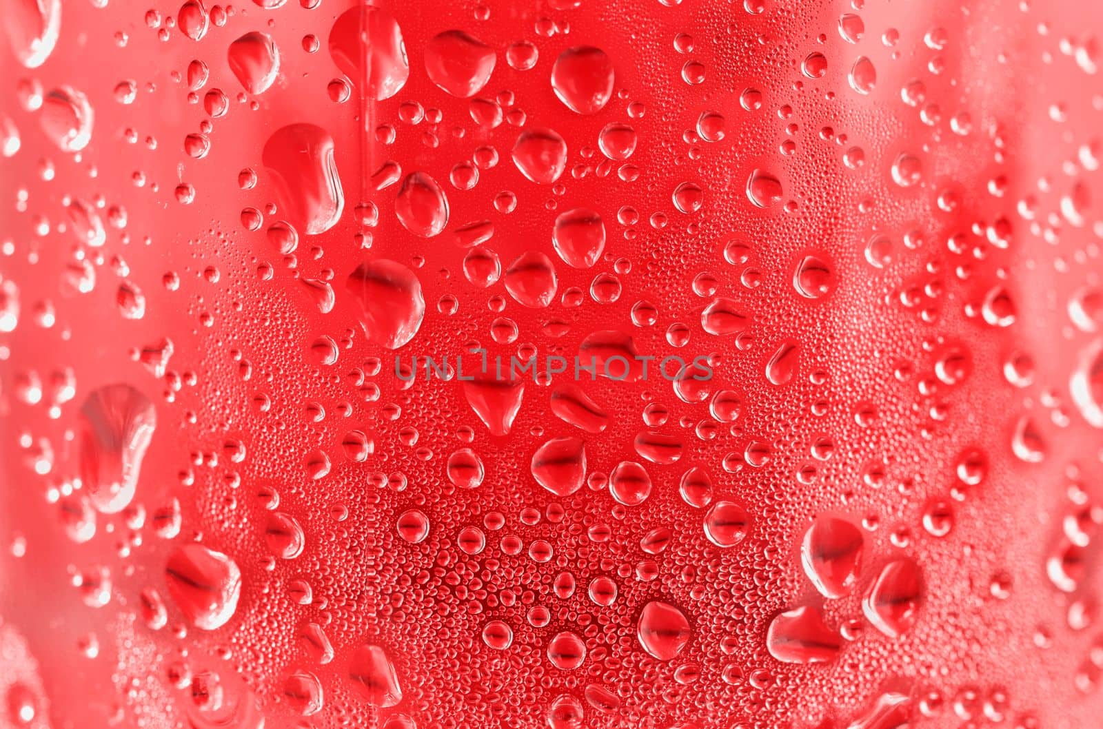 Red drops on glass ,full frame , background abstract