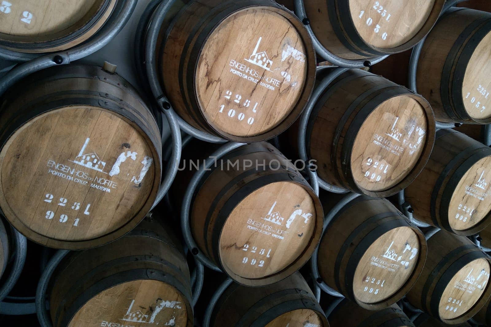 Madeira, Portugal, November 25, 2022: view of casks of rum at a rum and port wine factory in Porto da Cruz on Madeira island, Portugal