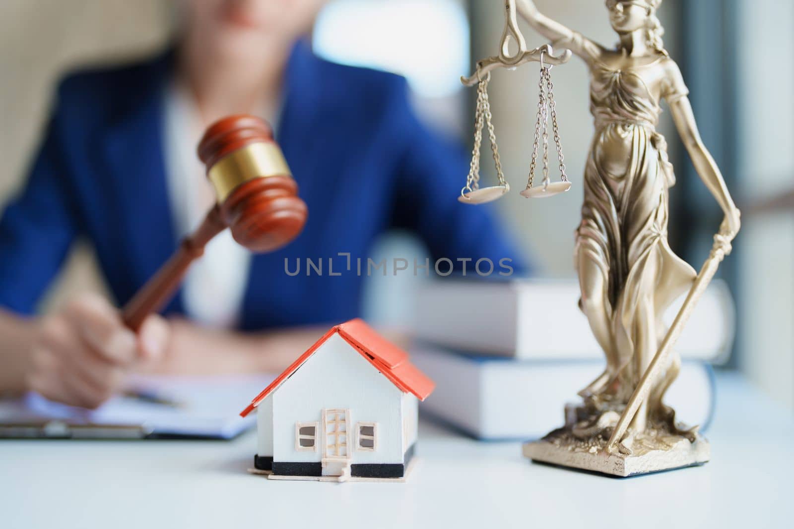 Law, Consultation, Agreement, Contract, Concept Attorney or Lawyer is sitting and accepting complaints from clients for home and land matters in court. by Manastrong