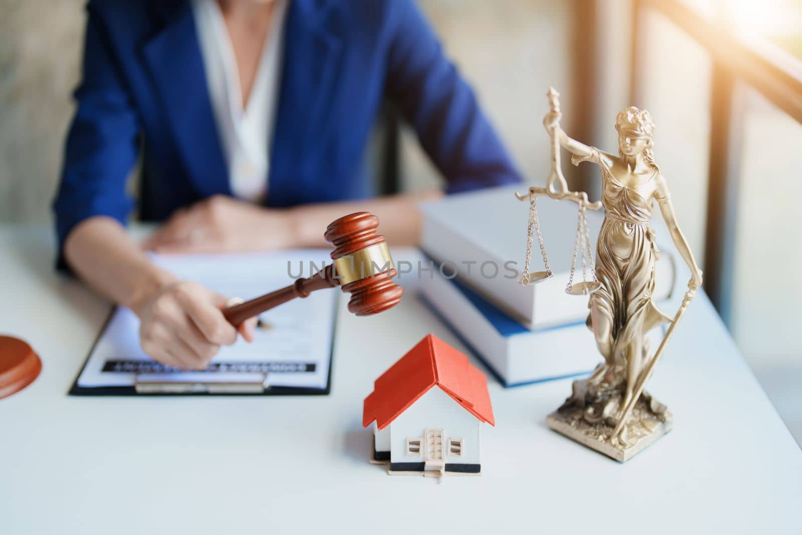 Law, Consultation, Agreement, Contract, Concept Attorney or Lawyer is sitting and accepting complaints from clients for home and land matters in court. by Manastrong