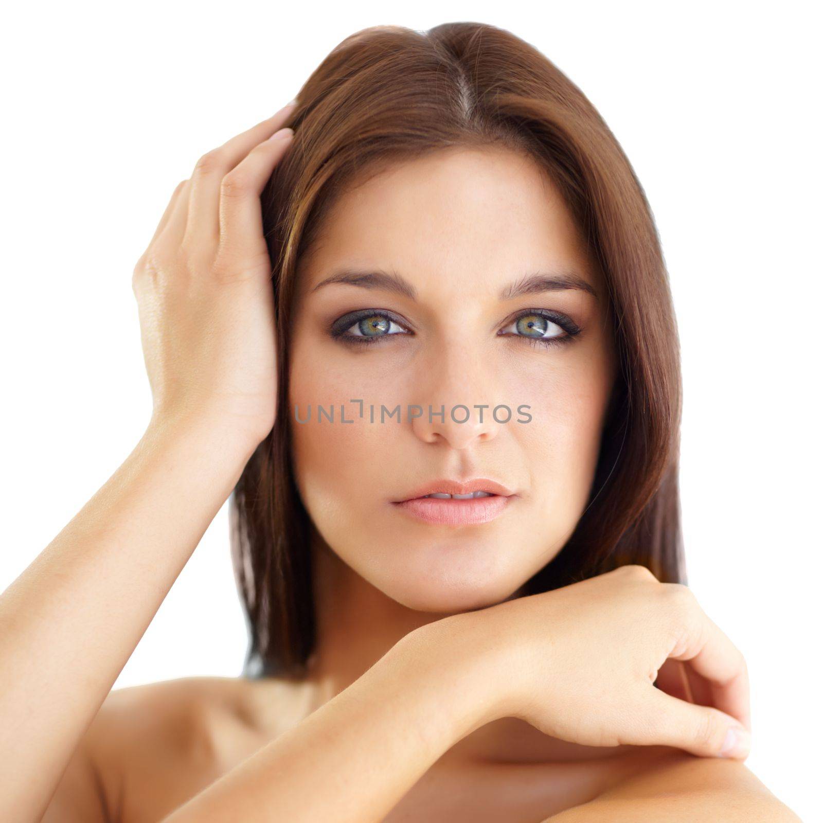 Her natural beauty shines through. Portrait of a beautiful young brunette on a white background. by YuriArcurs