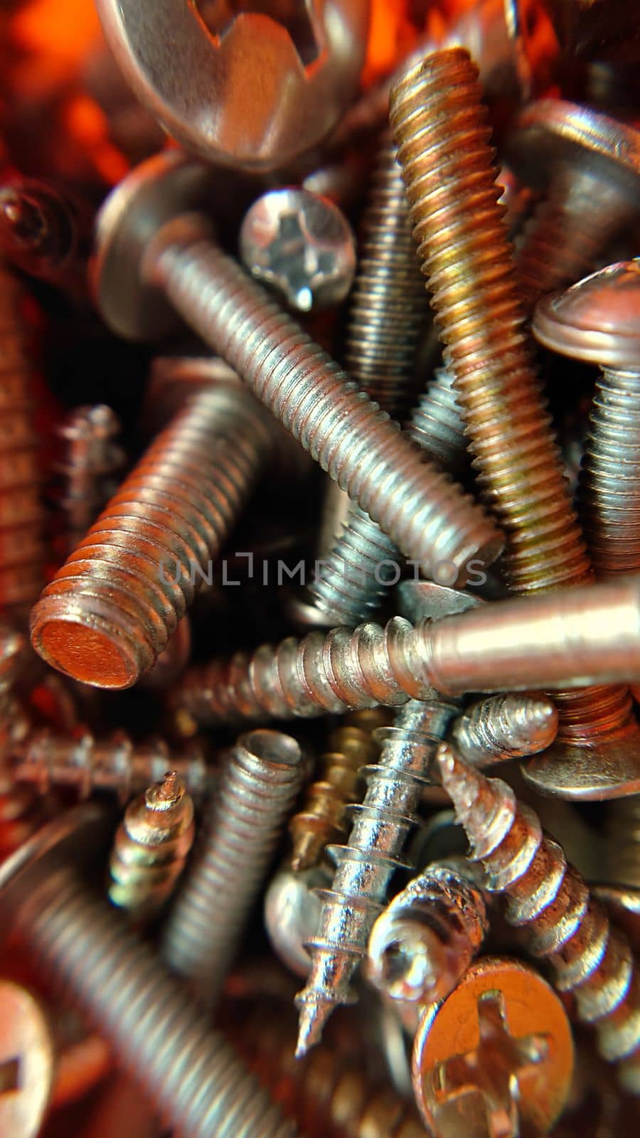 Bolts screws nuts mounting hardware .Macrophotography.Texture or background.Selective focus.