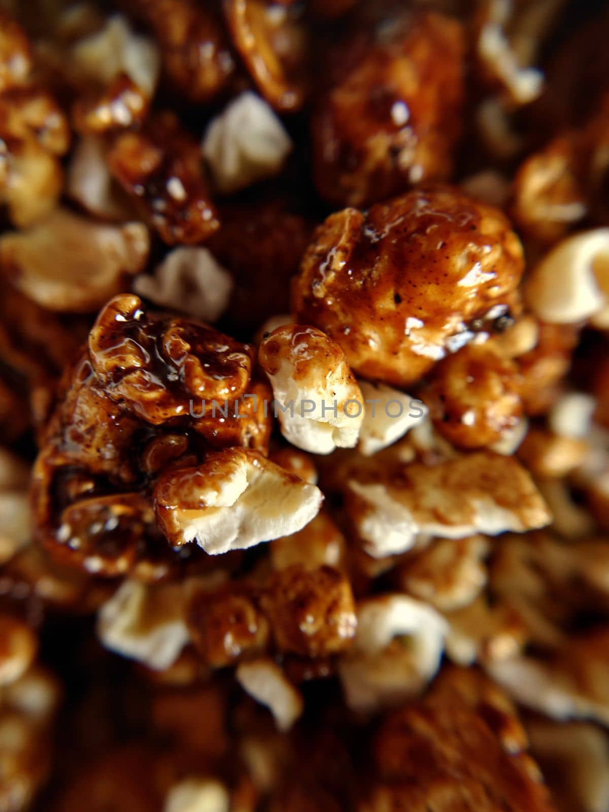 Background texture of sweet popcorn with caramel close-up.Macro photography.Texture or background.Selective focus.
