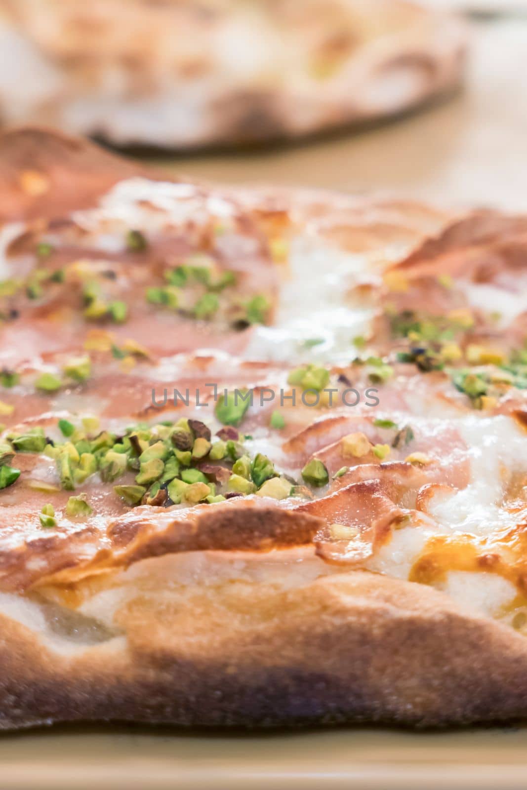 Italian pizza close-up by germanopoli