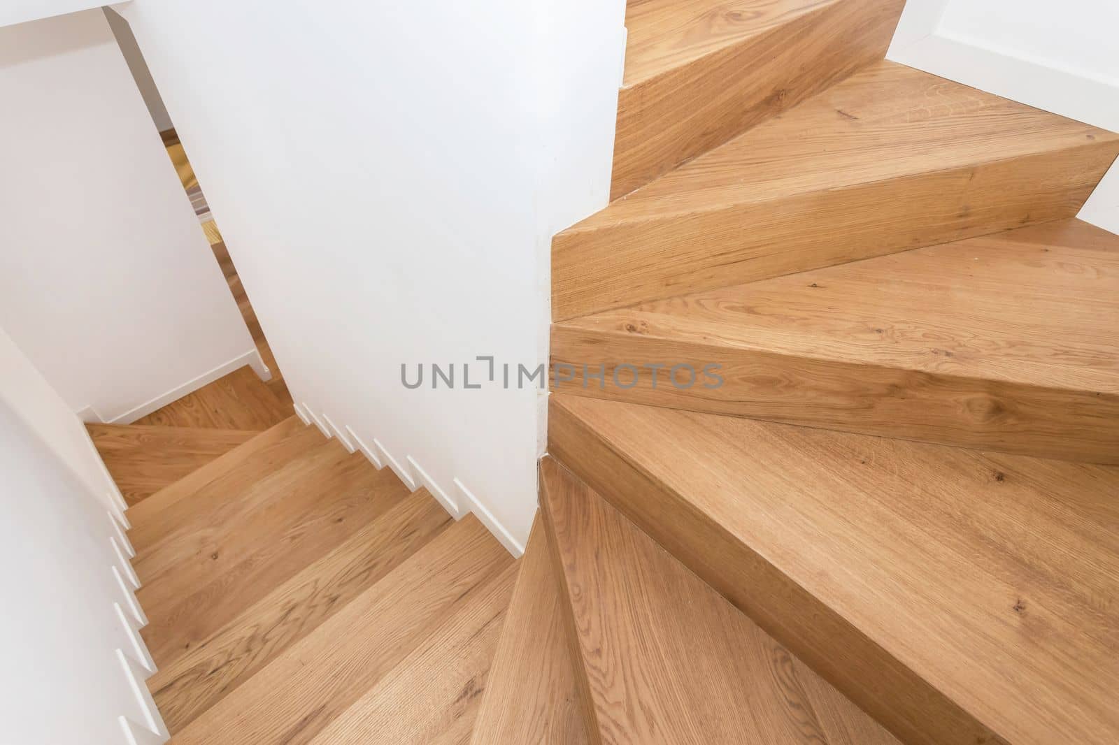 Modern residential wooden stairs by germanopoli