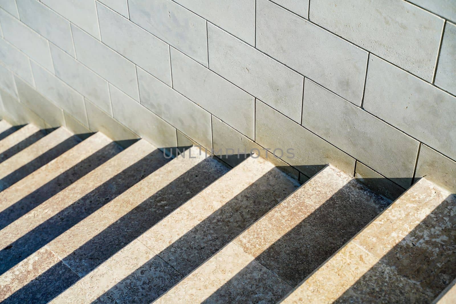 Staircase in the city, black and white pattern on the stairs on a sunny day