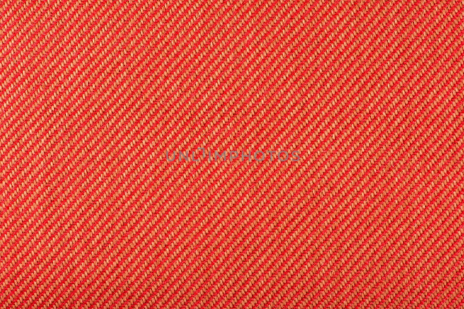 Texture of fabric for furniture upholstery. Wear-resistant fabric for furniture. Texture of red fabric close up top view