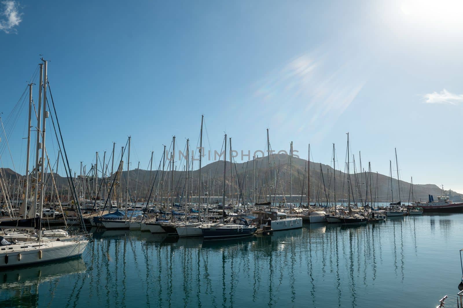 Marina in the tourist city of Cartagena with moored boats in the autumn of 2022. by martinscphoto