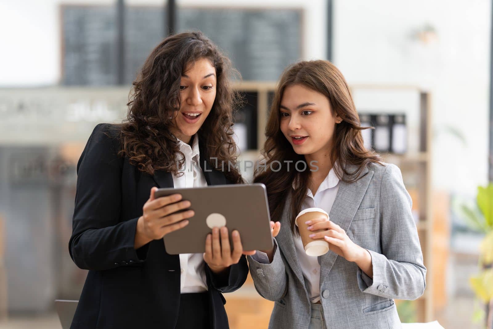 Fund managers team consultation and discuss about analysis Investment stock market by digital tablet.