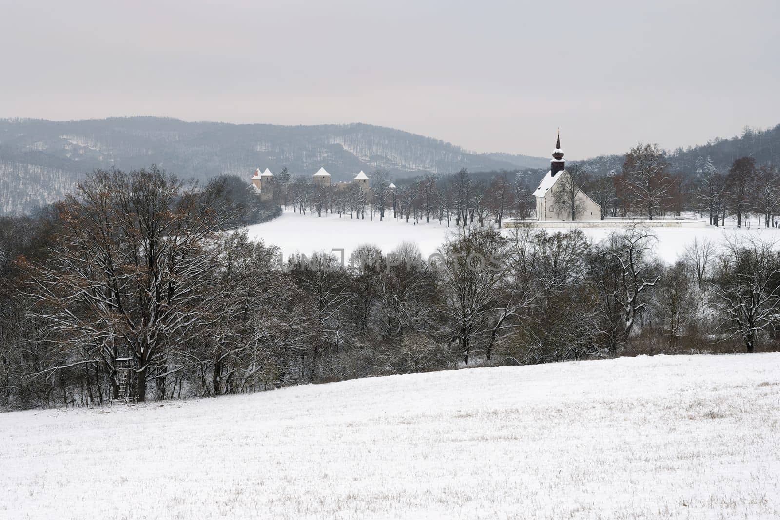 Winter landscape with a beautiful chapel near castle Veveri. Czech Republic city of Brno. The Chapel of the Mother of God.