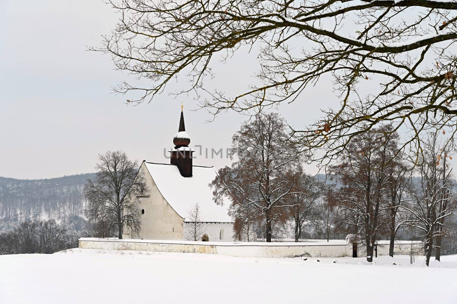 Winter landscape with a beautiful chapel near castle Veveri. Czech Republic city of Brno. The Chapel of the Mother of God.