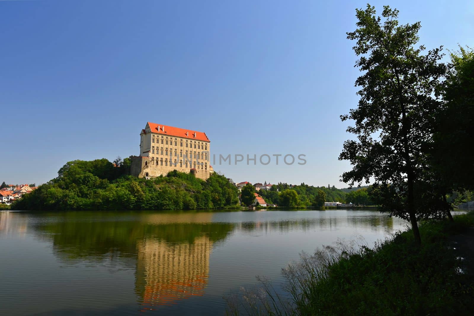 Plumlov - Czech Republic. Beautiful old castle by the lake. A snapshot of architecture in the summer season. by Montypeter