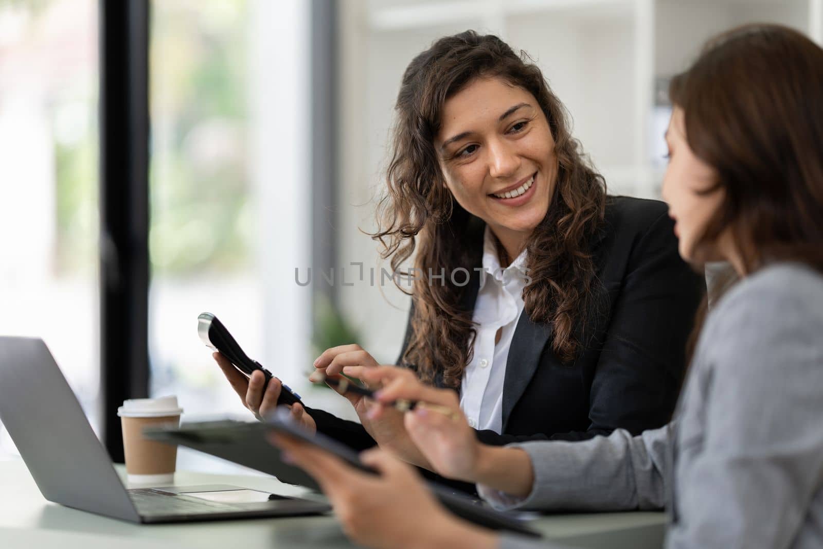 Fund managers team consultation and discuss about analysis Investment stock market by digital tablet.