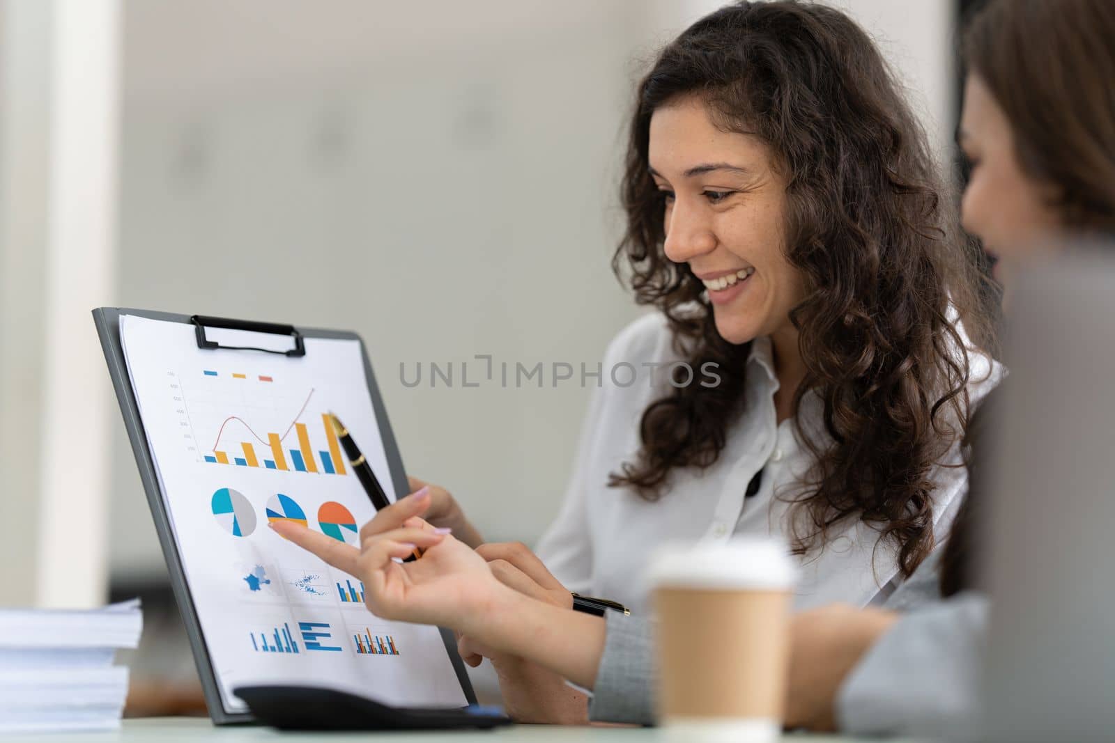 Business advisers are gathering to assess and debate the issue as it appears on the financial report. Financial counselor, investment consultant, and accounting concept.