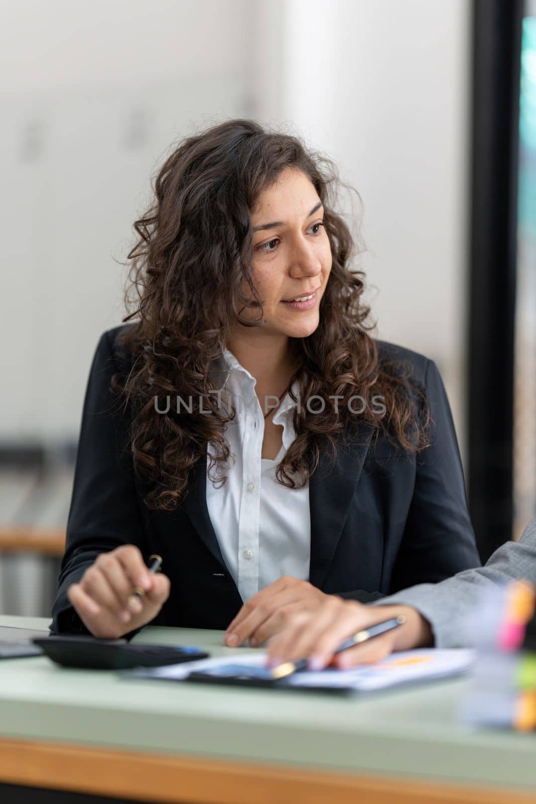 Business advisers are gathering to assess and debate the issue as it appears on the financial report. Financial counselor, investment consultant, and accounting concept.