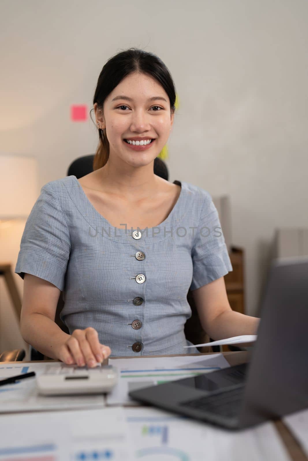 Asian woman working with laptop at home. work from home concept.