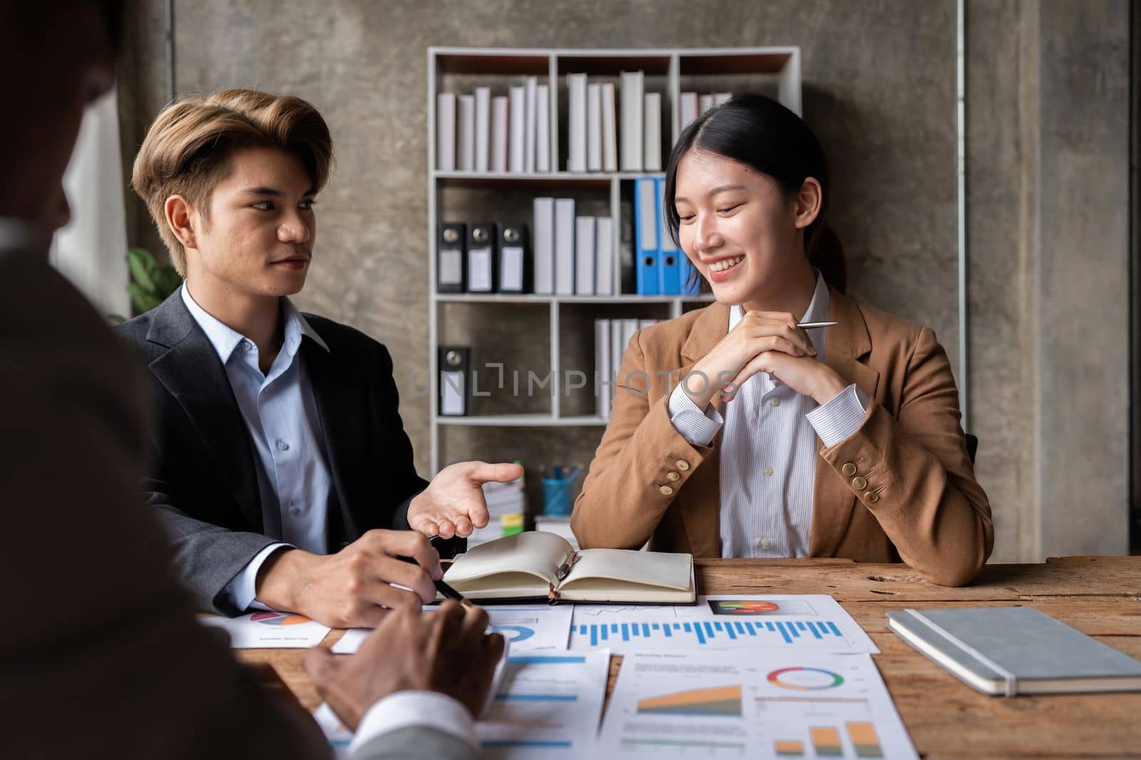 Business advisers are gathering to assess and debate the issue as it appears on the financial report. Financial counselor, investment consultant, and accounting concept.