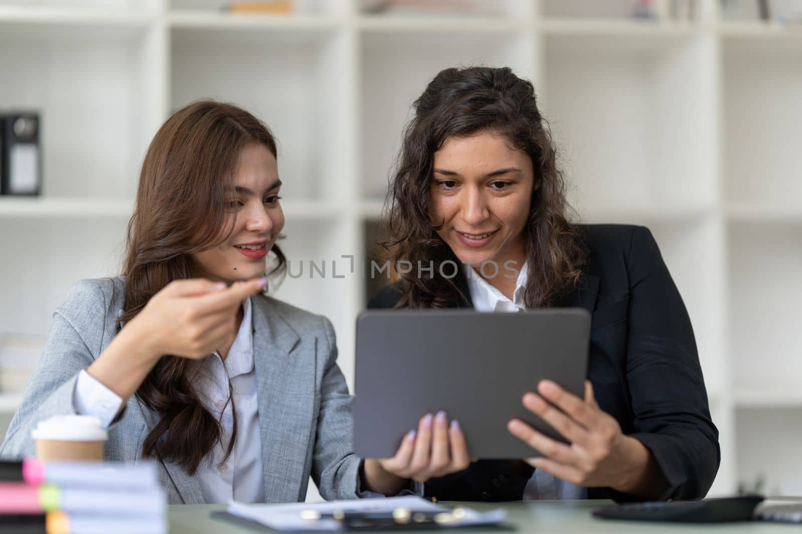 Business advisers are gathering to assess and debate the issue as it appears on the financial report. Financial counselor, investment consultant, and accounting concept.