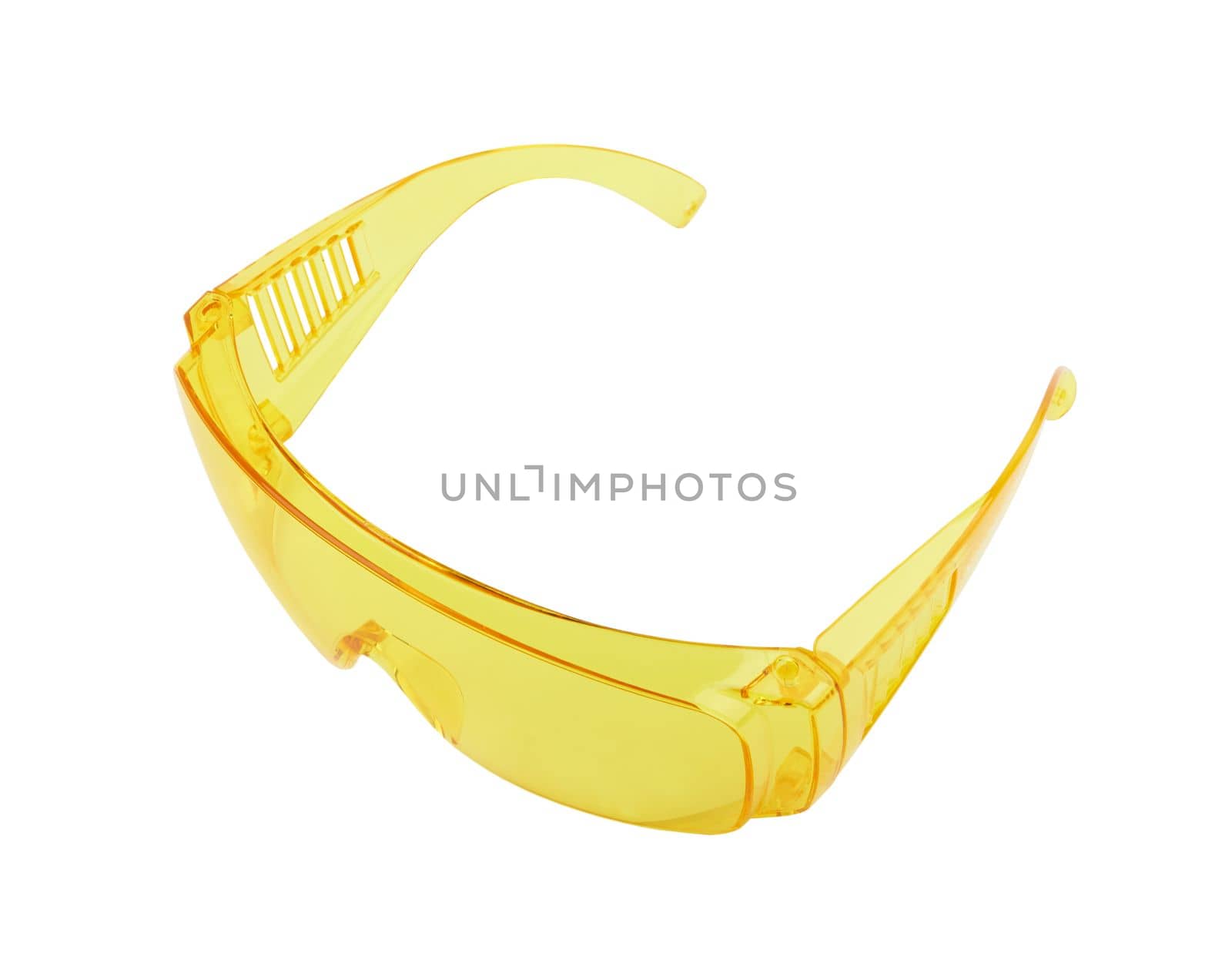Yellow plastic protective work glasses isolated on a white background