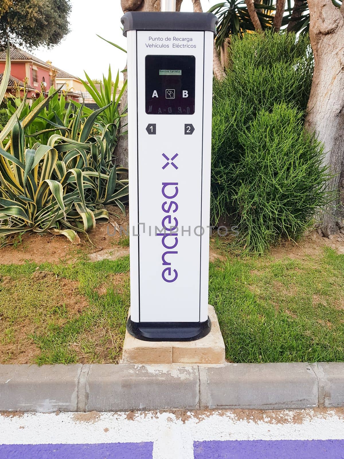 Jerez de la Frontera, Andalusia, Spain. 7th July 2021. Charging point for electric vehicles of the Endesa company located on the street.