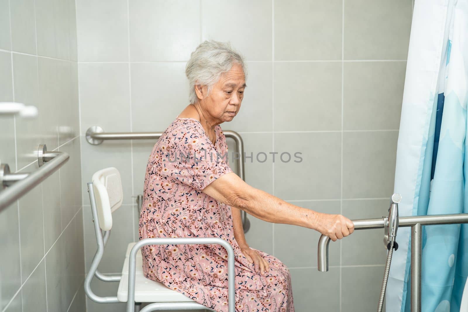 Asian senior or elderly old lady woman patient use toilet bathroom handle security in nursing hospital ward, healthy strong medical concept. by pamai