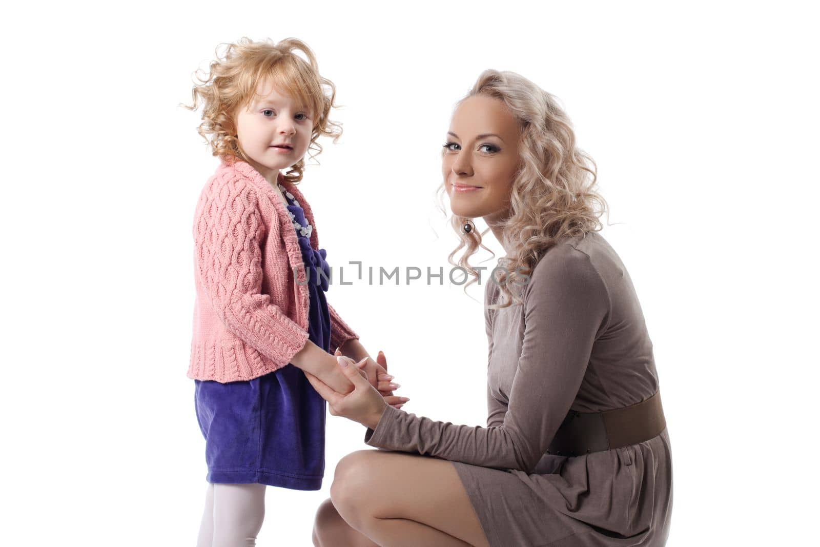 Happy mother and daughter. Isolated on white