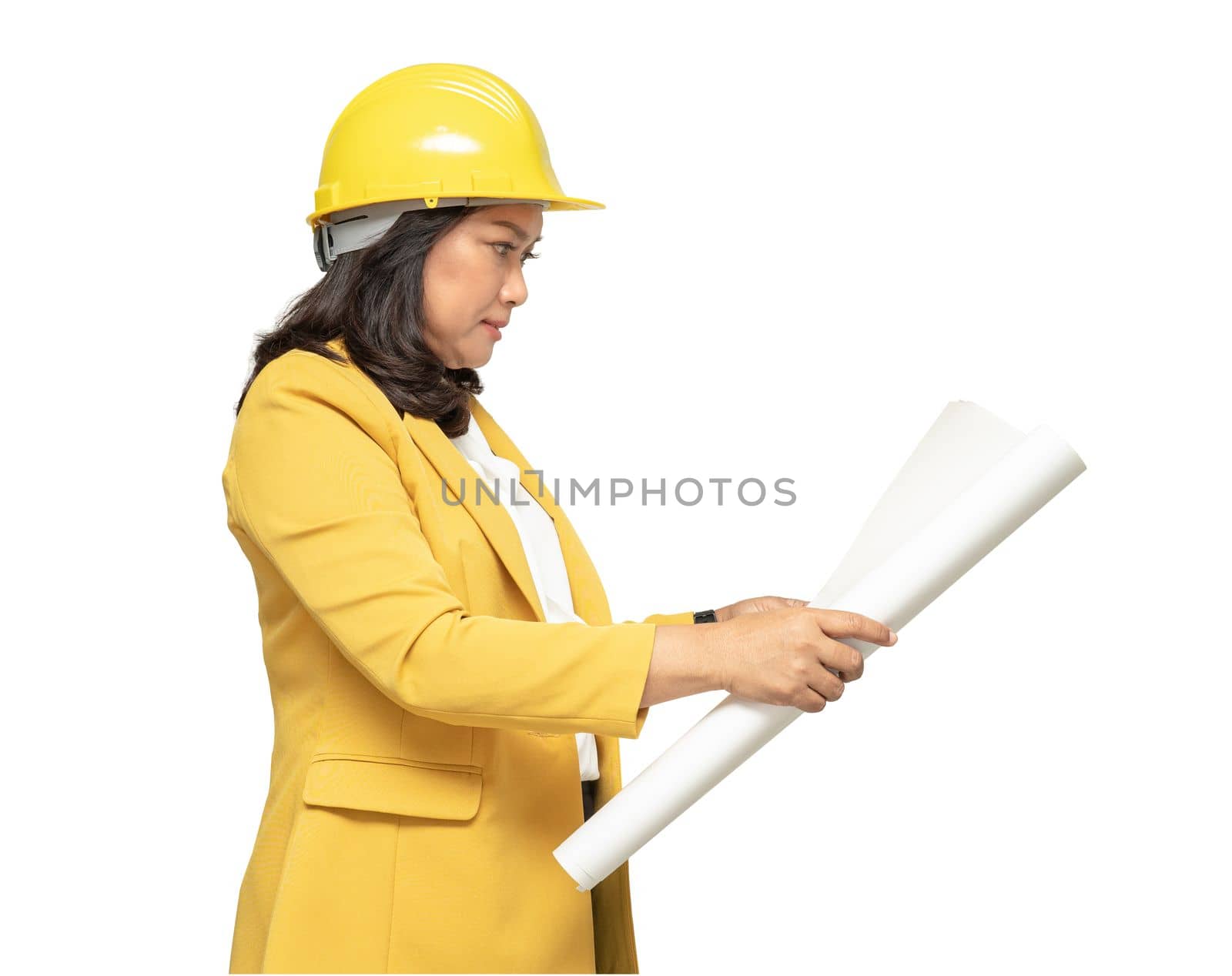 Engineer holding yellow helmet with blueprint isolated on white background with clipping path.