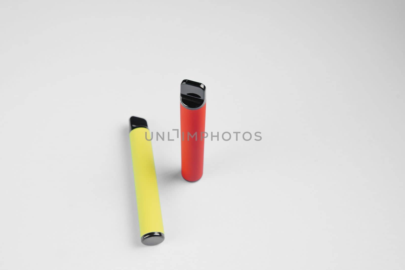 E-cigarette on a white background isolate. Alternative to smoking. The modern device for smoking