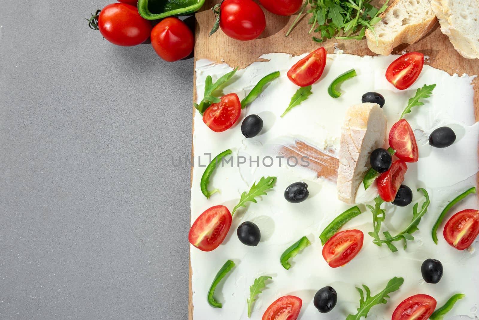 A food trend, bread with butter and toppings. Board with butter snack. Breakfast snack. Trend. Copy space by gulyaevstudio