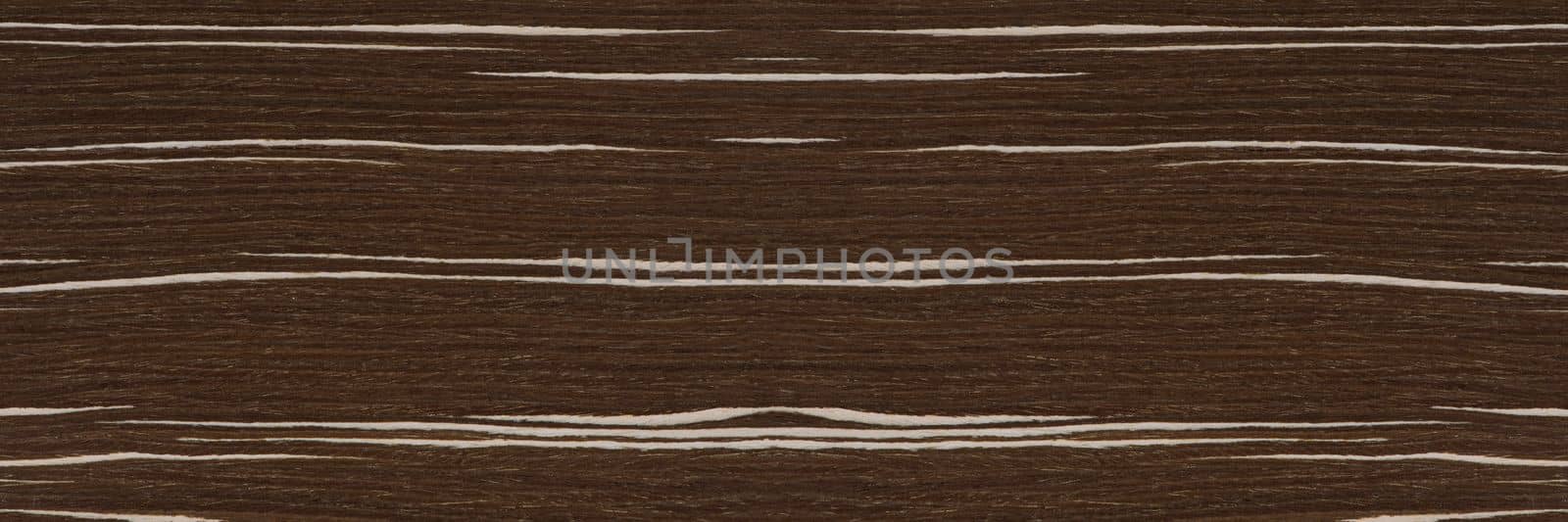Texture of wood with stripes. Texture of natural African wood with zebra pattern. High resolution photo of a brown black board. by SERSOL