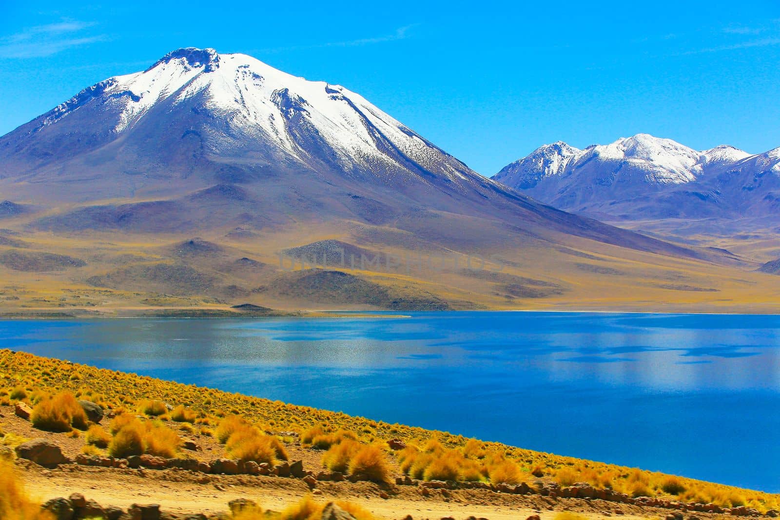 Valley of the Moon and lake at Sunset, Atacama Desert dramatic landscape, Chile, South America