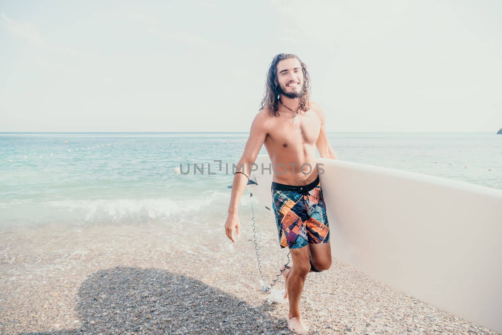 Asian man swimming in sea water and paddleboarding passing beautiful sea at summer sunset. Healthy strong male enjoy outdoor active lifestyle and water sports on holiday vacation