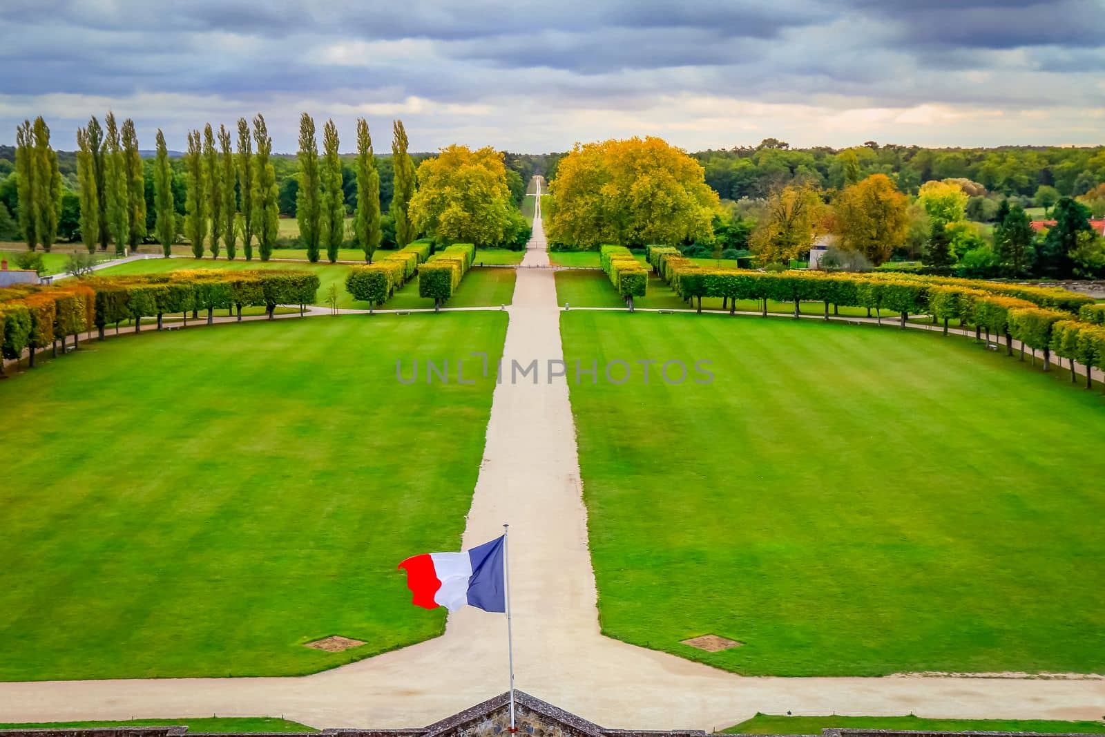Autumn foliage colors in Loire valley public park with garden landscape, France