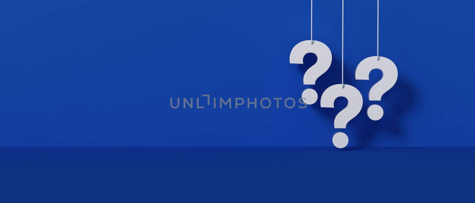 Three white question marks a blue wall background. by ImagesRouges