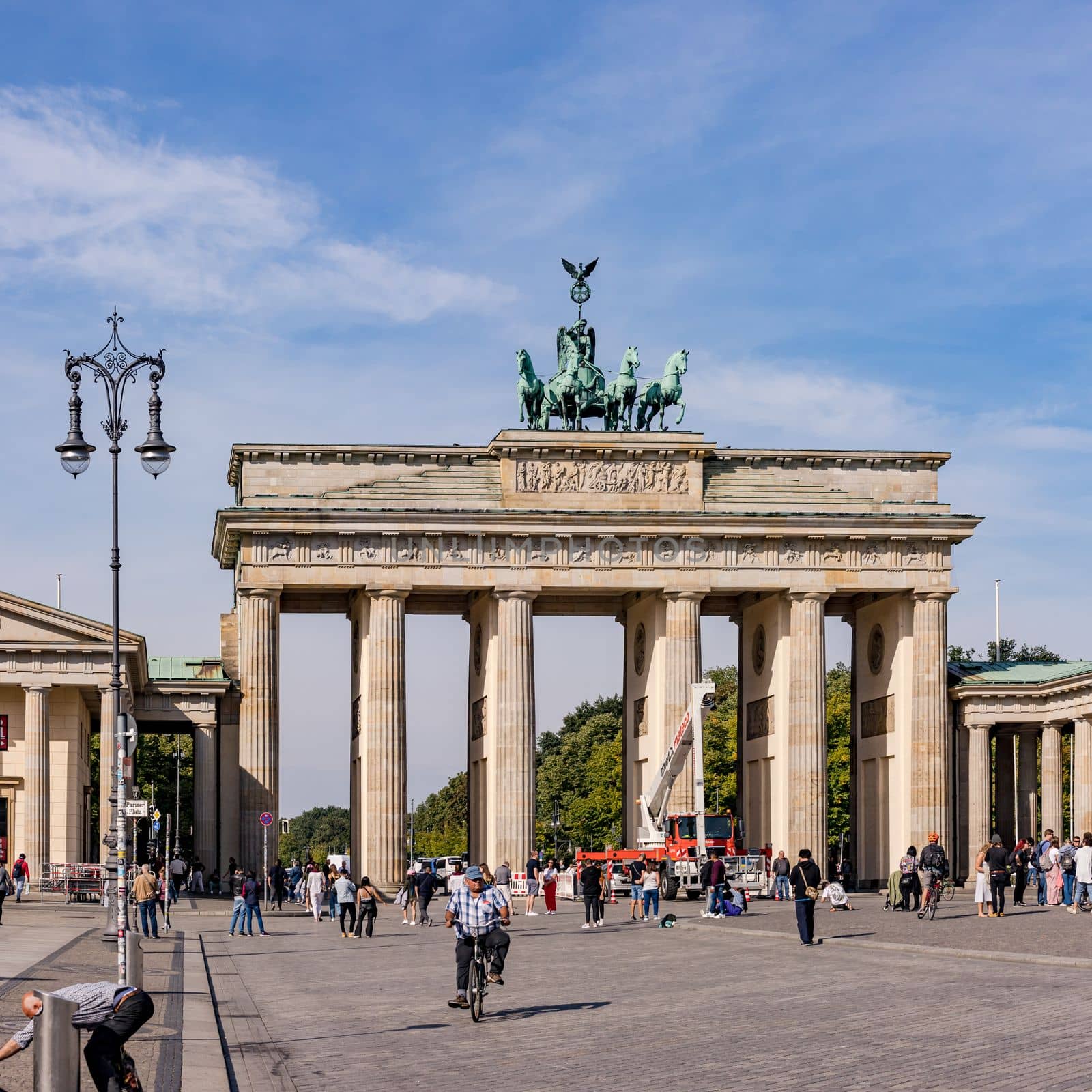 The famous Brandenburg Gate in Berlin as a landmark of German unity, Berlin, Germany by astrosoft