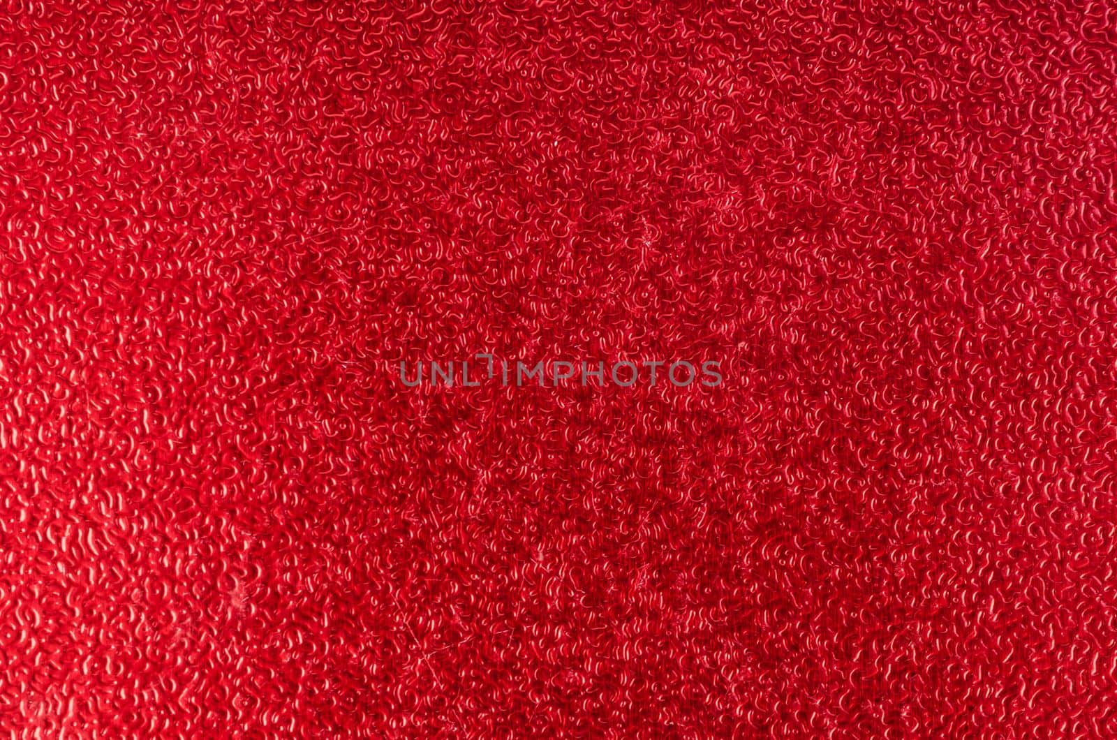 Christmas Red Foil Paper Glitter textured as Background.