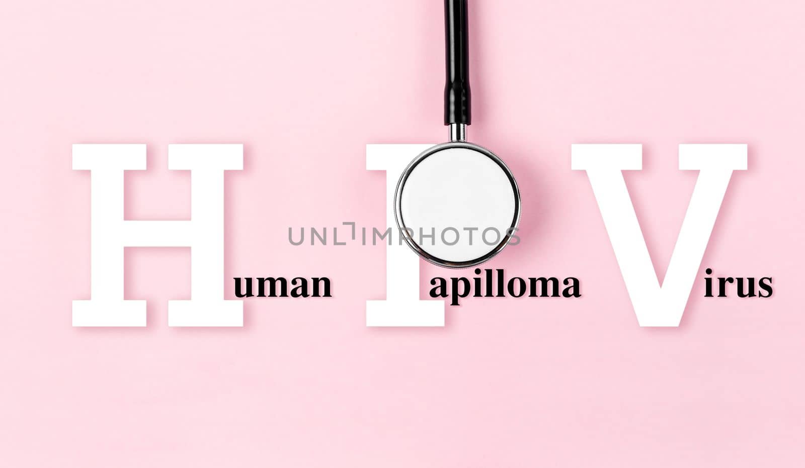 Human Papillomavirus or HPV and medical stethoscope on pink background, Screening for preventive cervical cancer in woman concepts.