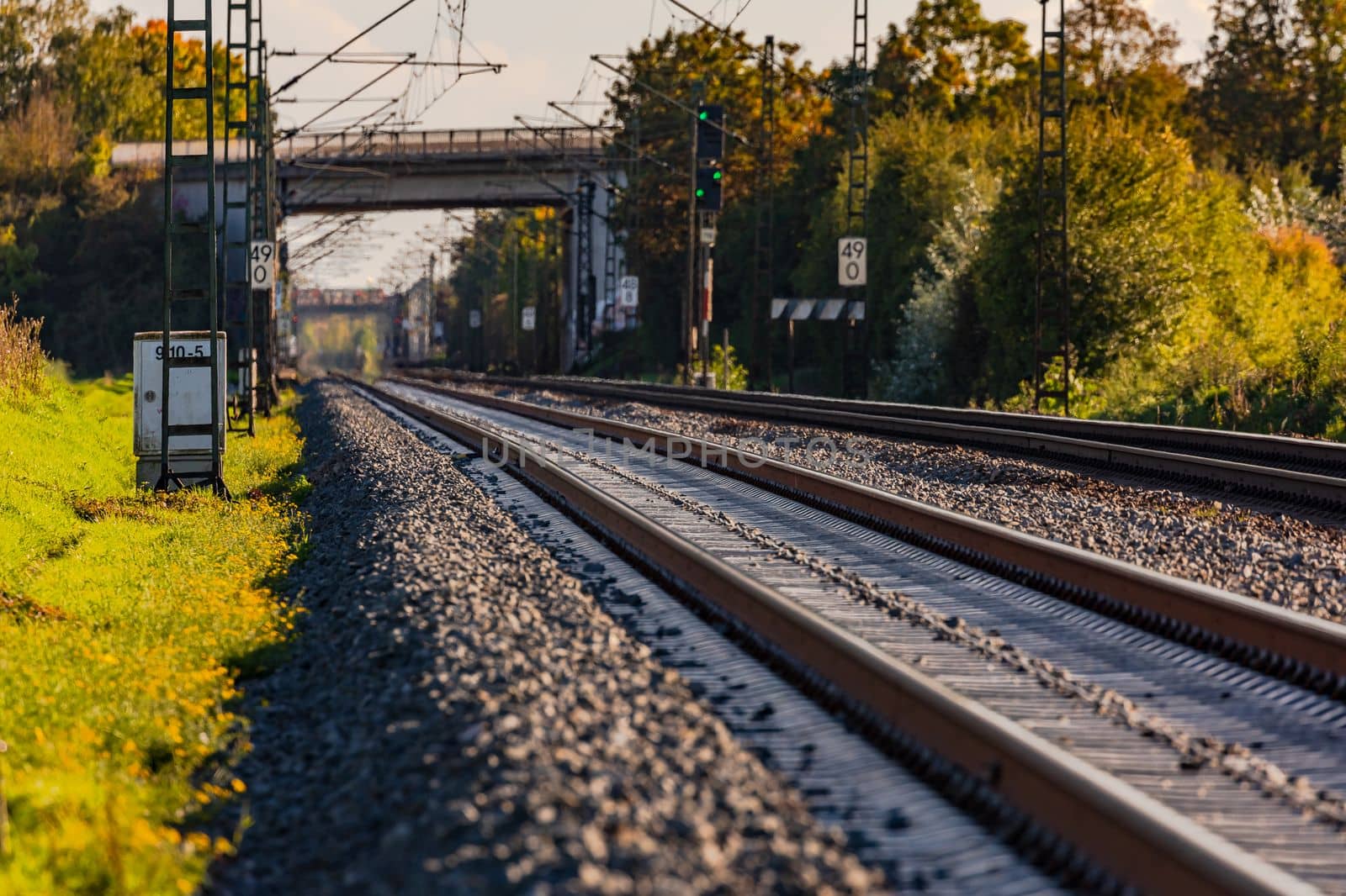 Track and rails with a bridge and a track bed with ballast