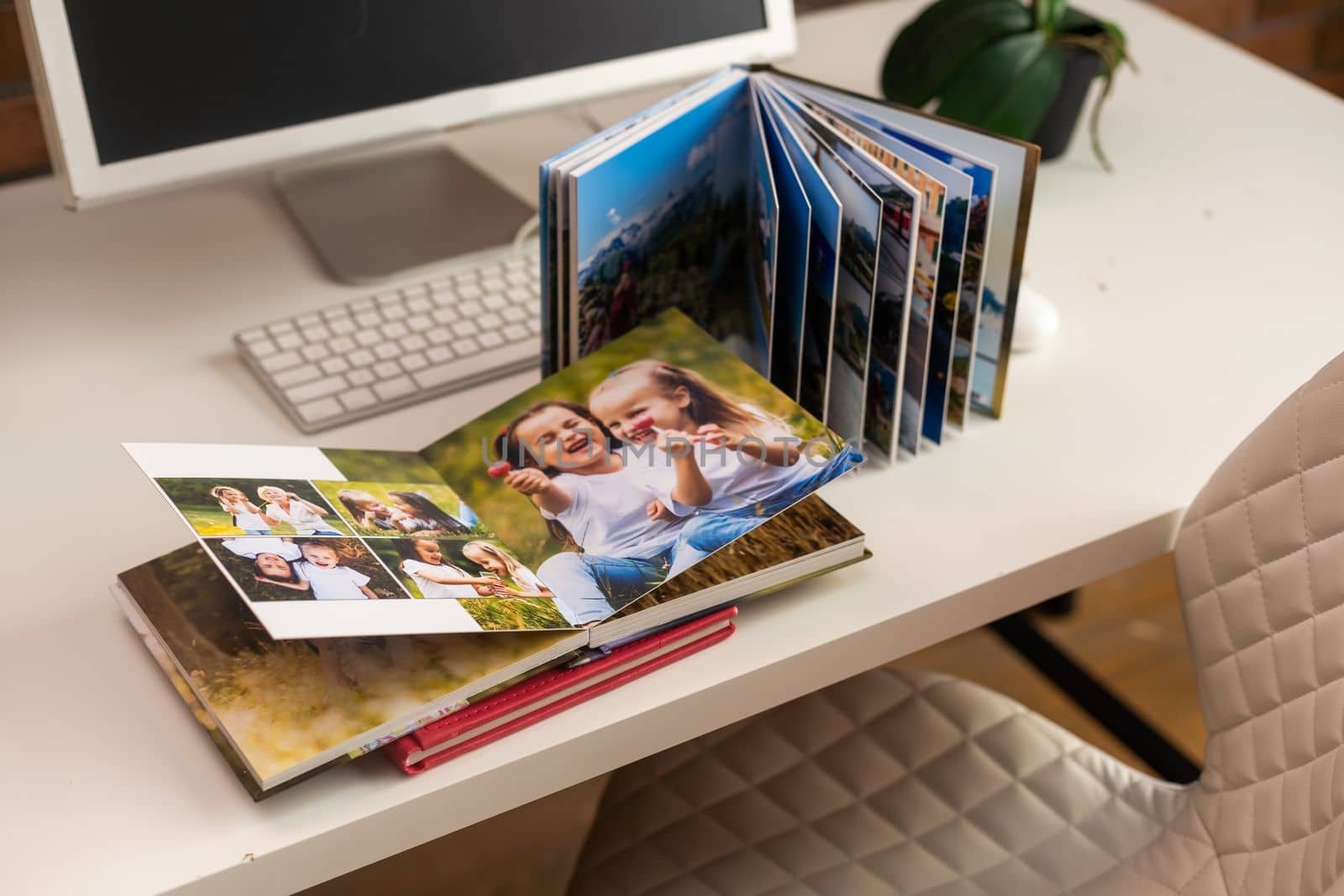 Family photos archive saved in brightly designed photo book, bright summer memories placed in the photobook by Andelov13