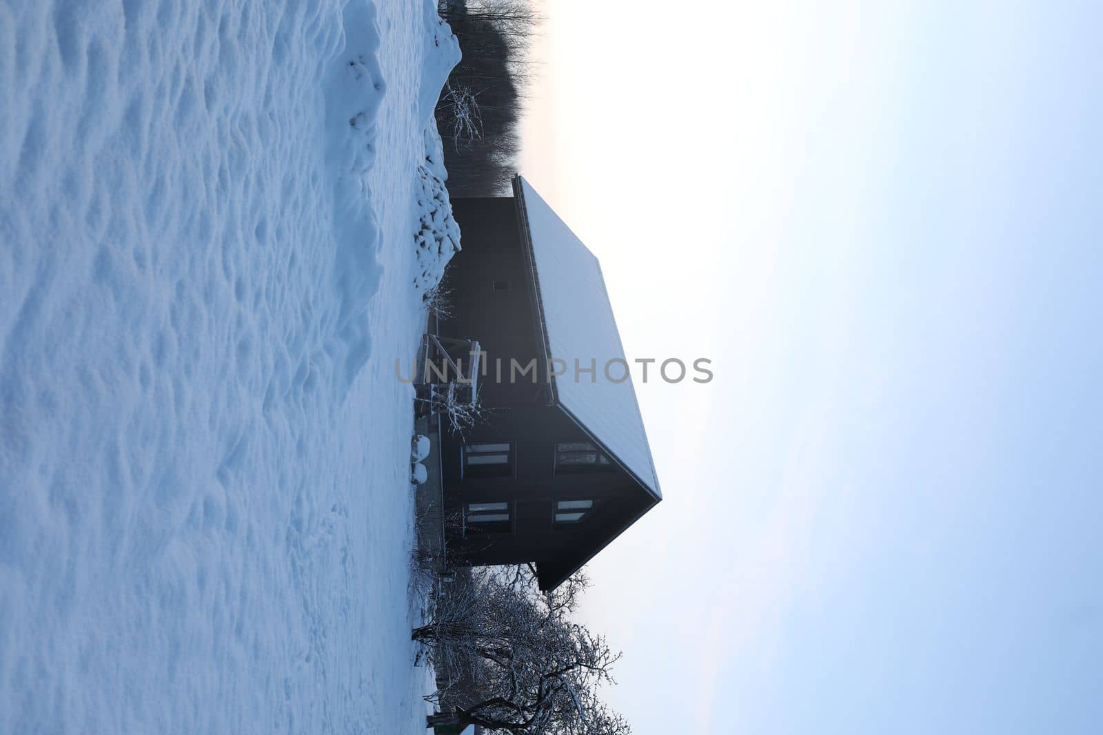 Barnhouse. Wooden secluded house in the Scandinavian and Finland modern style with large windows. Exterior, wooden walls