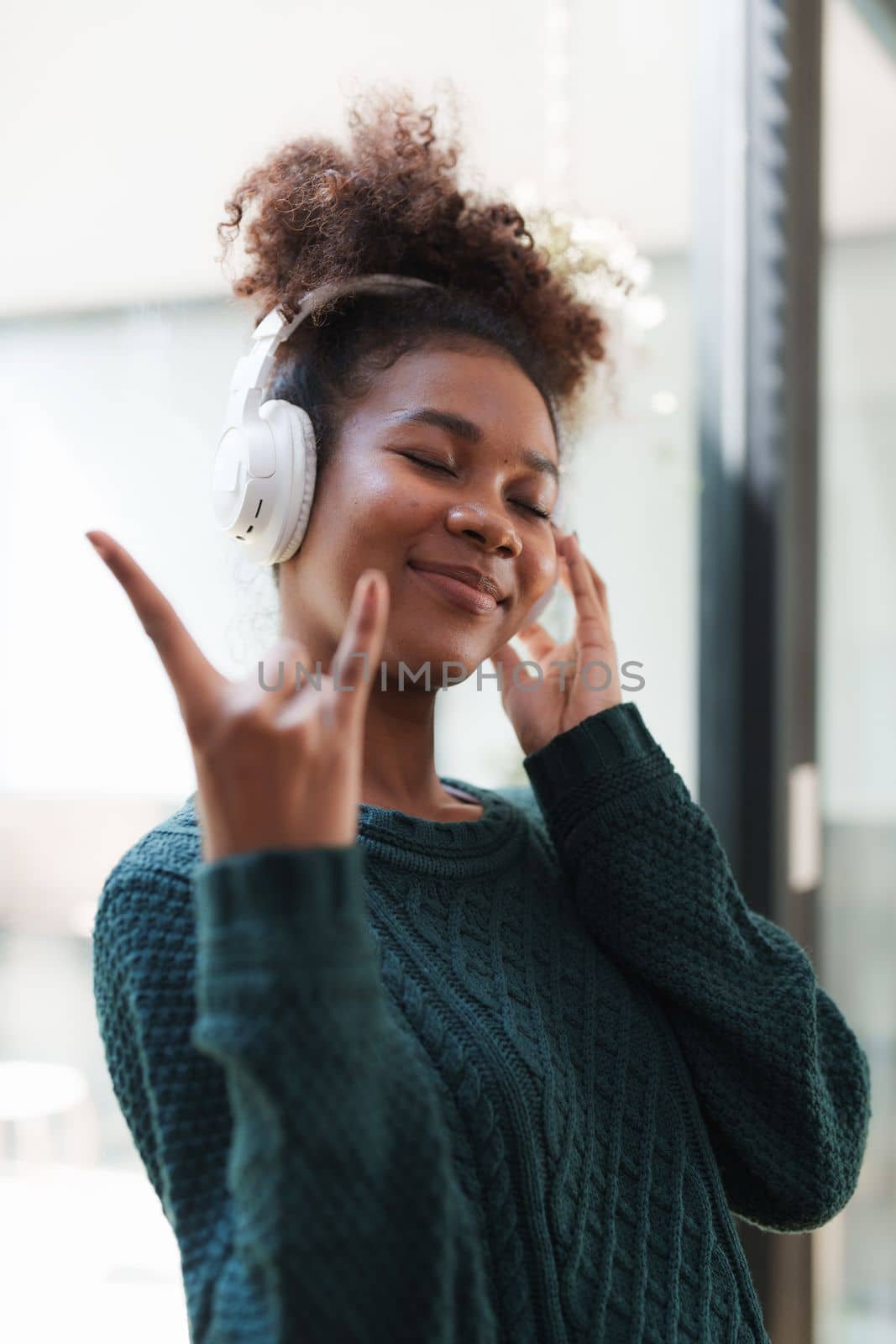 Young Black Woman Listening To Music Online Wearing Wireless Earphones, Enjoying Favorite Song. Playlist, Music Application.