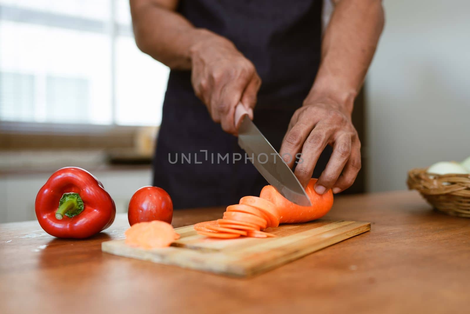 Portrait of asian man making salad at home. cooking food and Lifestyle moment.