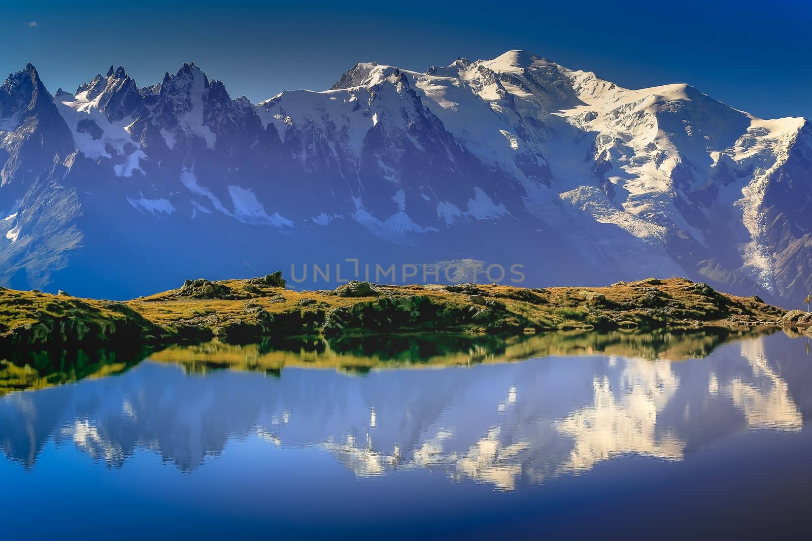 Mont Blanc and idyllic lake Cheserys reflection, Chamonix, French Alps at sunset