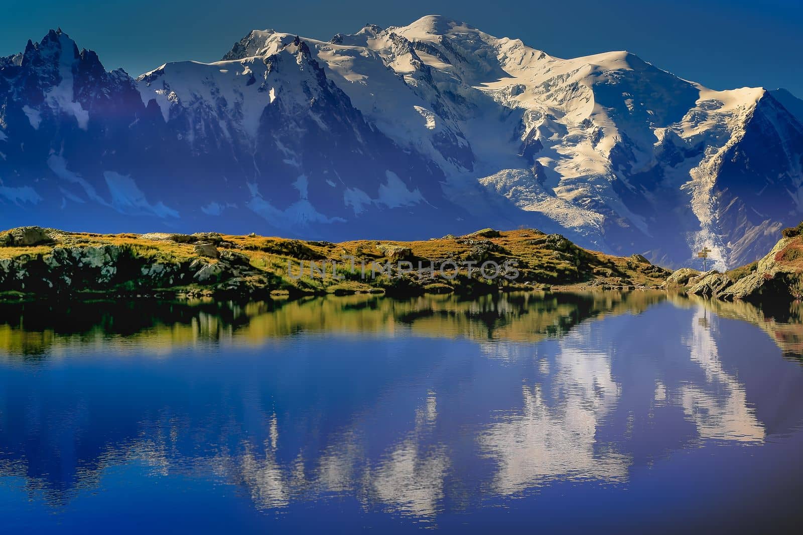 Mont Blanc and idyllic lake Cheserys reflection, Chamonix, French Alps at sunset